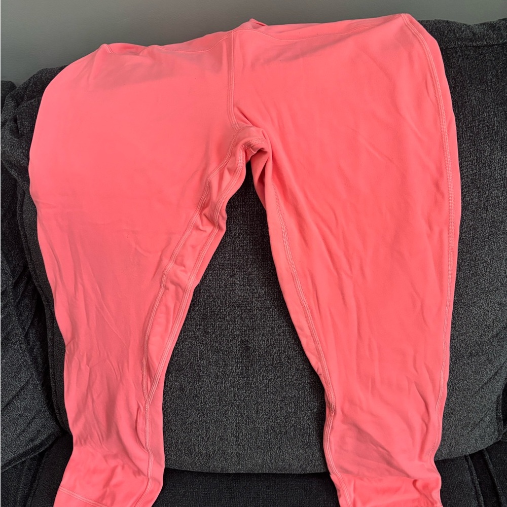Lululemon leggings.  Orange/pink color.  Size 10